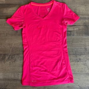 Nike Dri-fit pink soft tee with air holes in back.